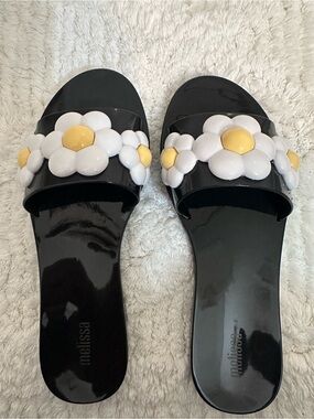 Melissa Black Slide Sandals with White & Yellow Daisy Embellishments